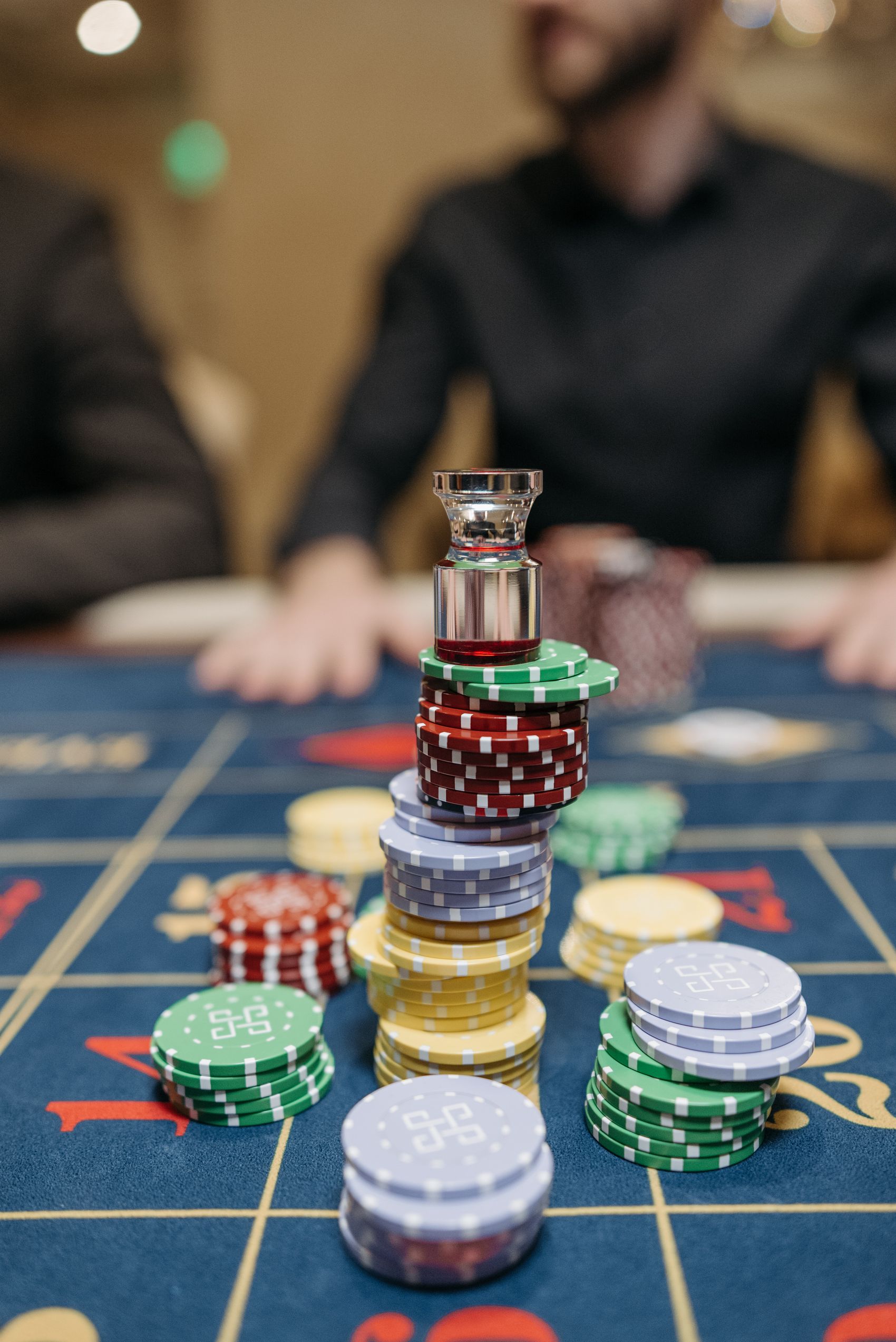 Stock casino table and gaming chips illustrating the casino concept